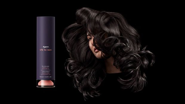 Side-by-side images showing model with dark curled hair next to Dyson Chitosan Pre-style cream and model with curly coily hair next to the Pre-style cream