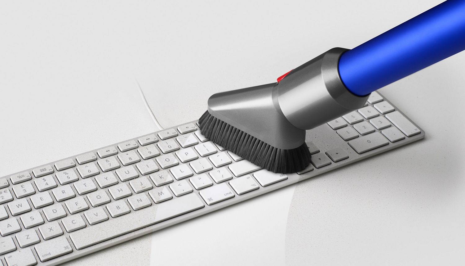 Dyson Soft dusting brush used to vacuum keyboard