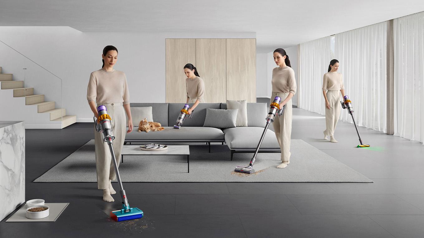 Dyson V15s Detect Submarine used by woman in living room to wash hard floors and vacuum