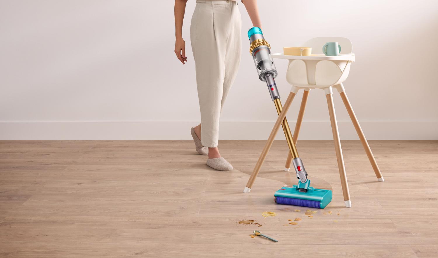 Dyson V15s Detect Submarine used to wash spills underneath baby highchair
