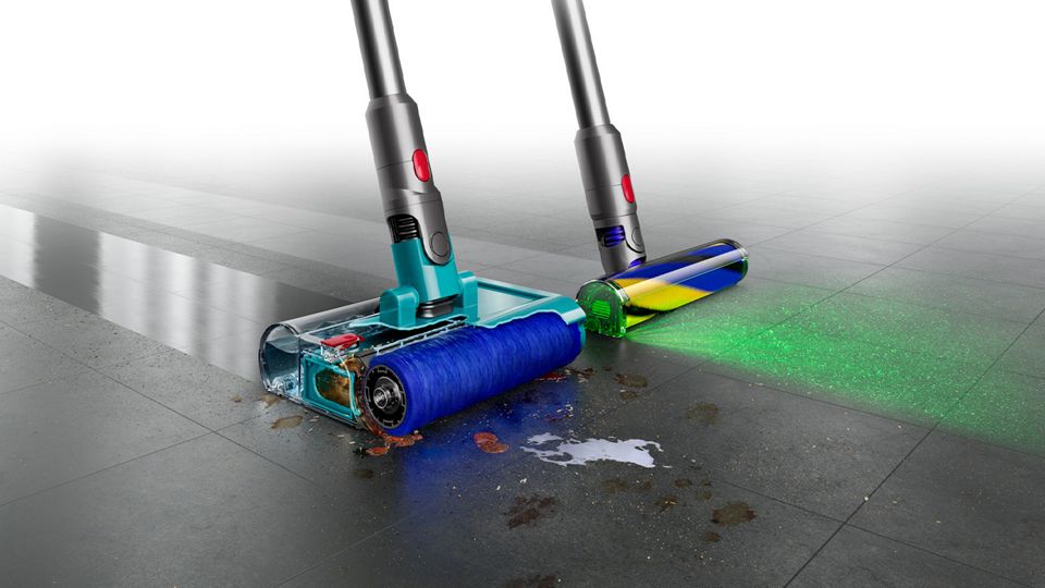 Dyson Submarine wet roller head and Dyson Fluffy Optic cleaner head side by side cleaning hard floor