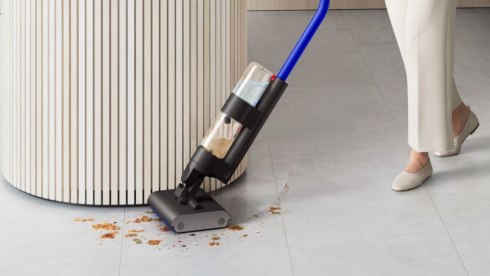 Dyson WashG1 wet rollers used to clean up floor