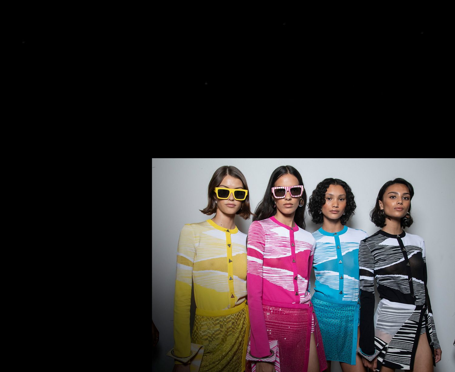 Four models wearing clothes from SS23 week