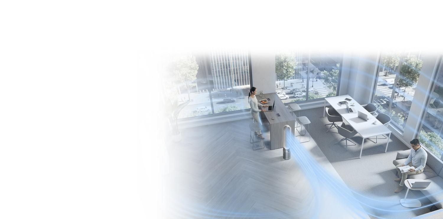 Dyson tower purifier fan projecting purified air around an open-plan office