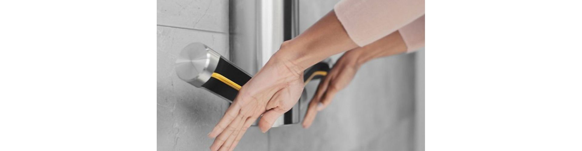 Three Dyson Wash+Dry hand dryers