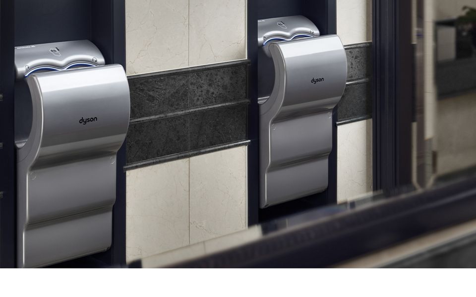 2 Dyson Airblade dB hand dryers in hotel bathroom