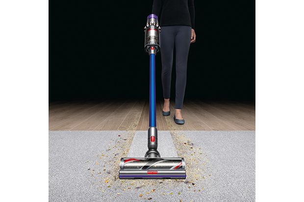 Dyson vacuum cleaner cleaning carpet