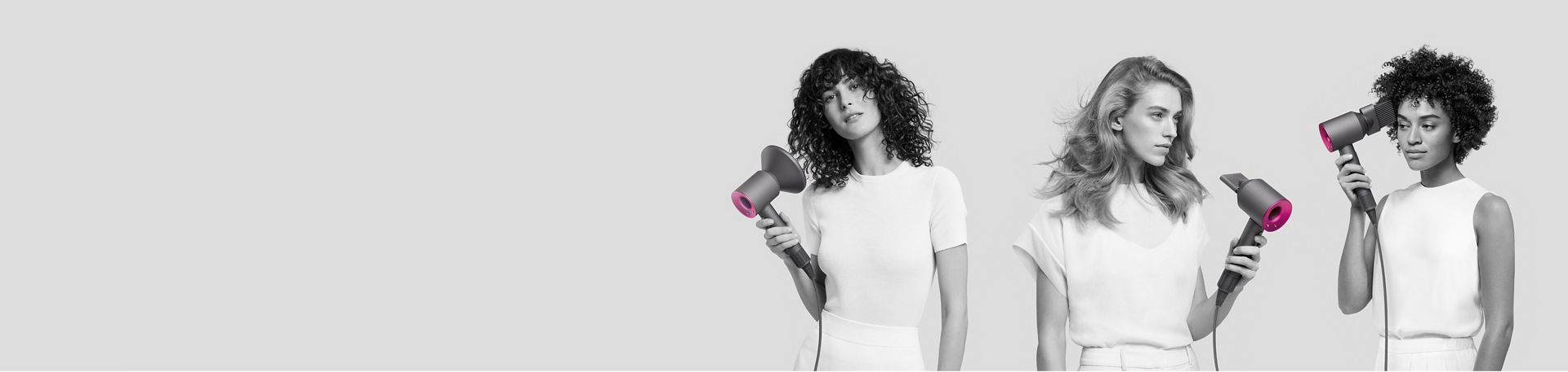 Drei Frauen mit unterschiedlichen Haartypen nutzen den Dyson Supersonic Haartrockner.