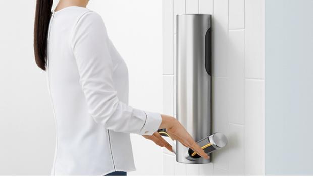 Woman using the Dyson Airblade 9kJ