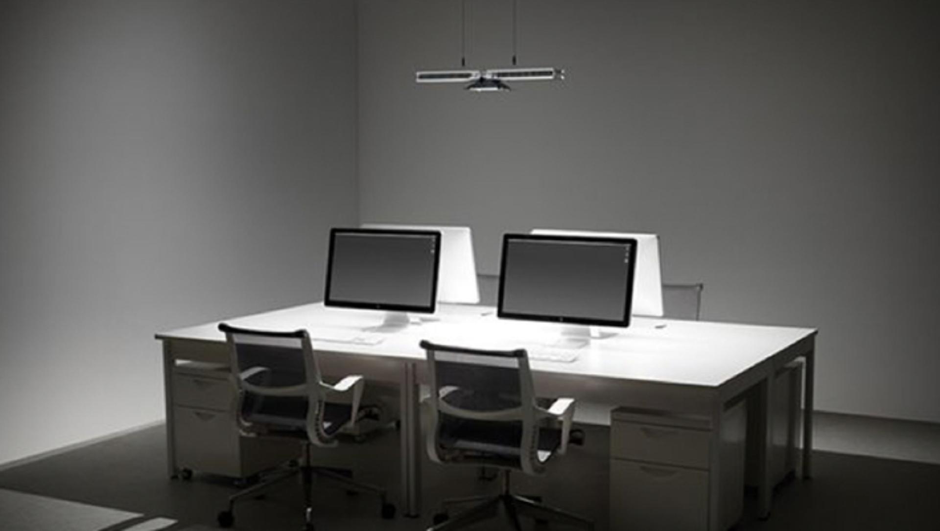 Computers lit by Dyson cu-beam down light