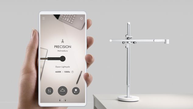 Smartphone showing Link app with the Lightcycle desk light in the background. 