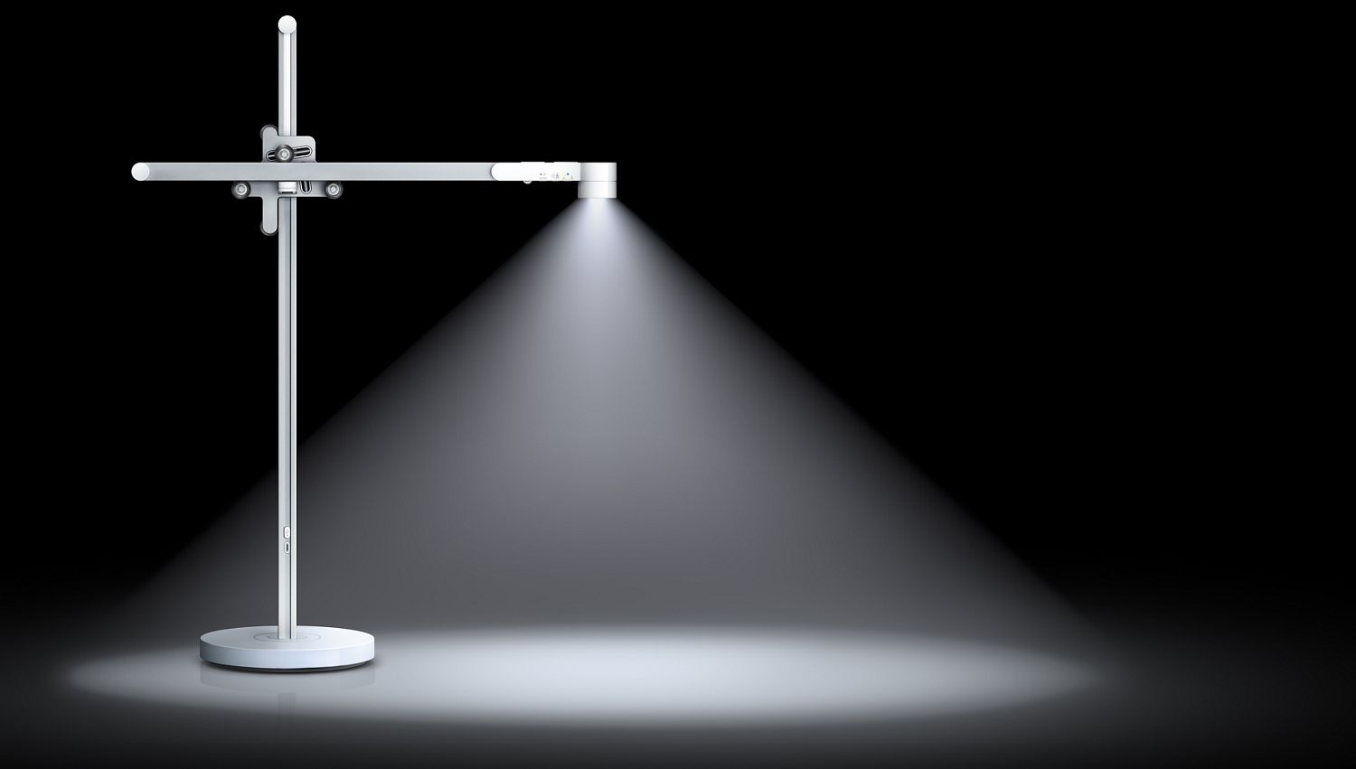 Dyson lightcycle desk in a dark room