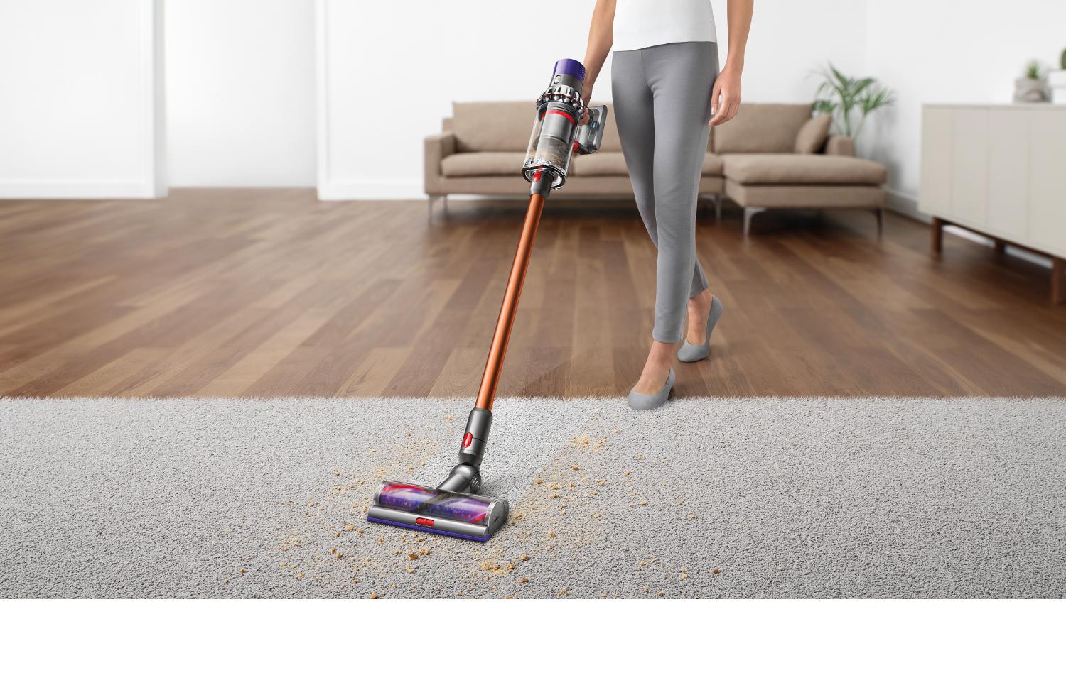 Dyson V10 vacuum cleaner lifting dirt from carpet