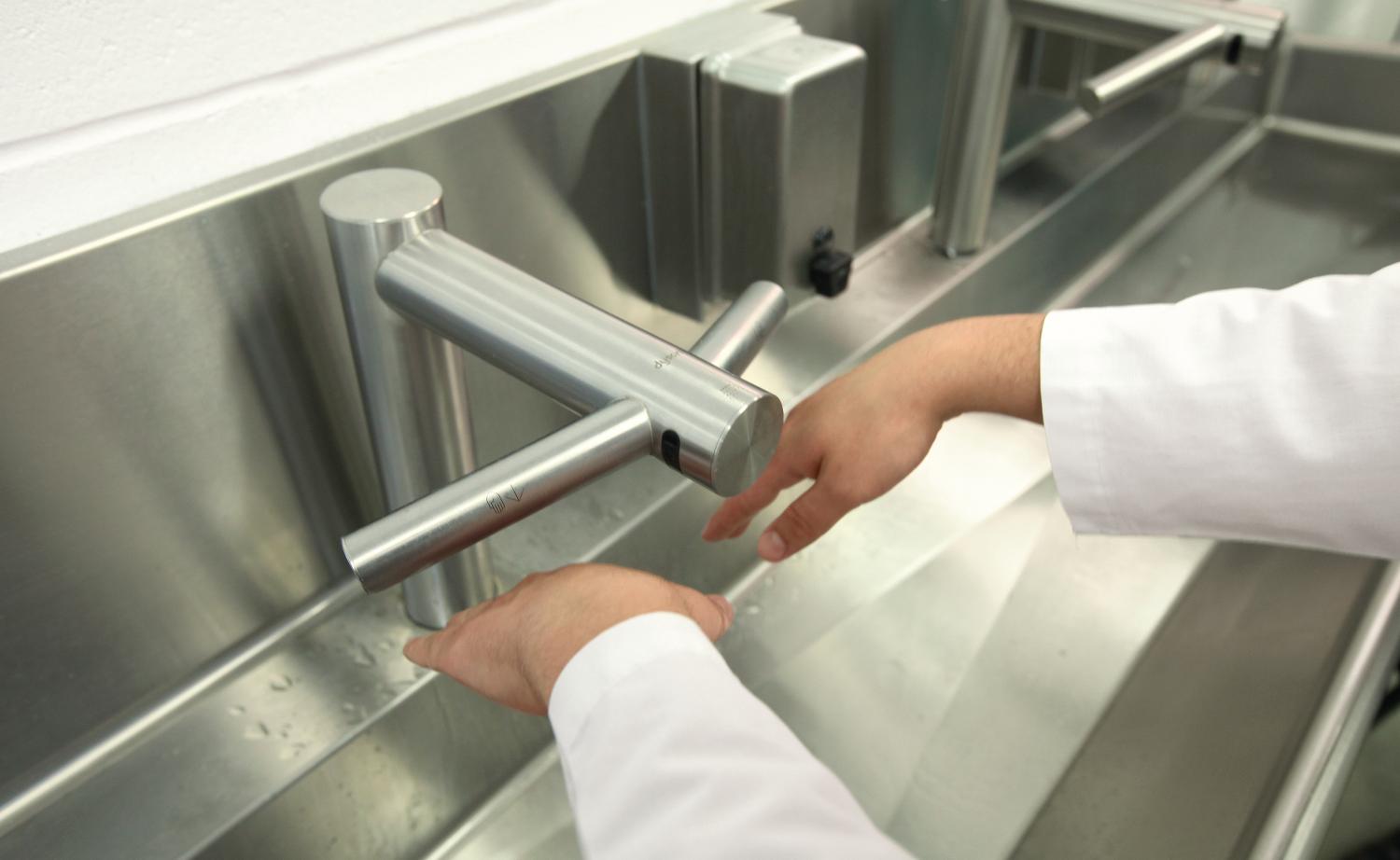 Still from video of Airblade Tap hand dryer