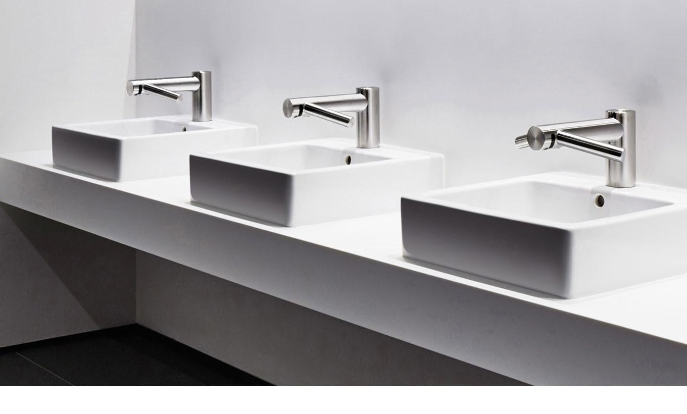 A row of Dyson Airblade hand dryers
