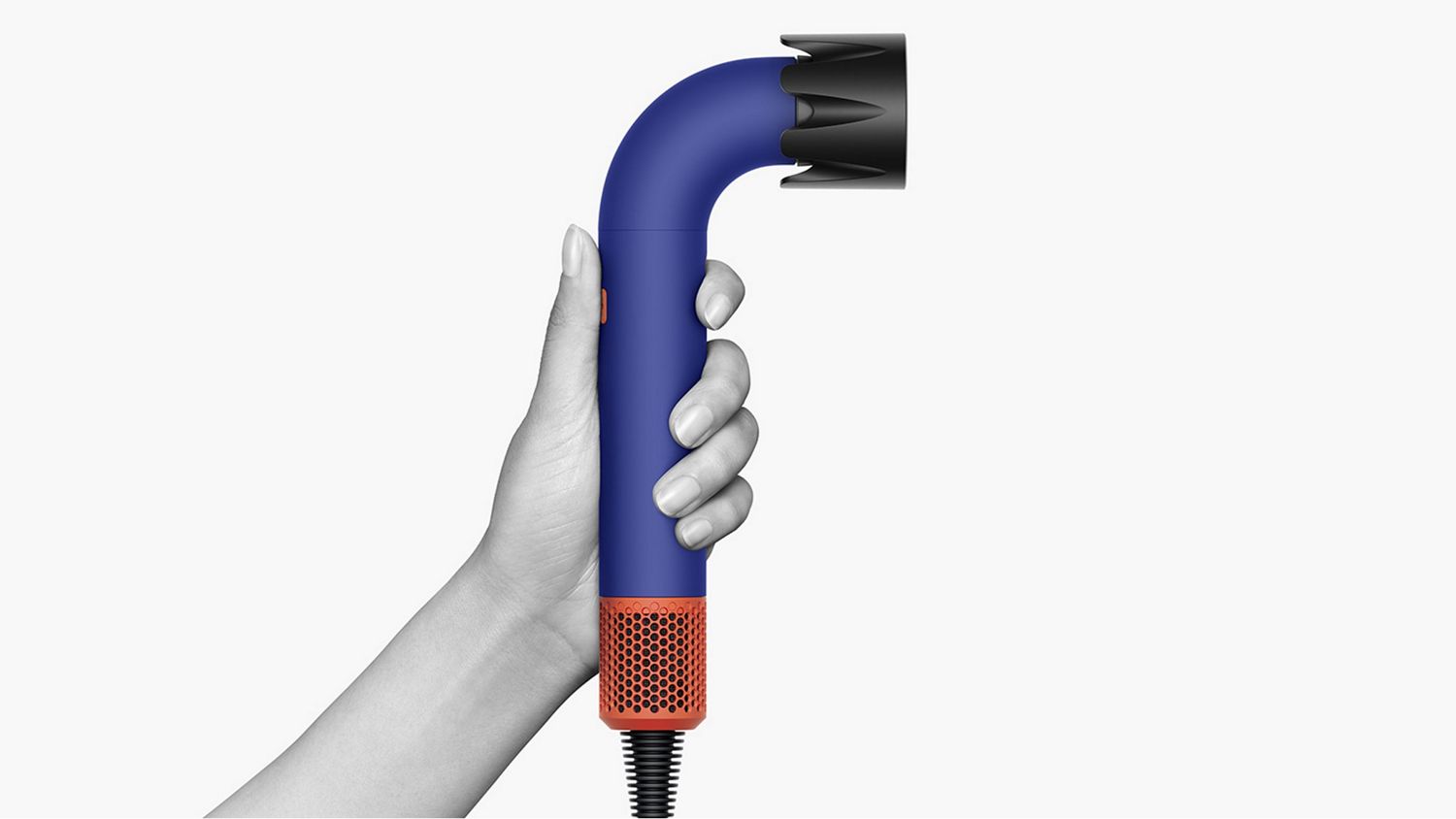 Hand holding the Dyson Supersonic r Professional hair dryer.