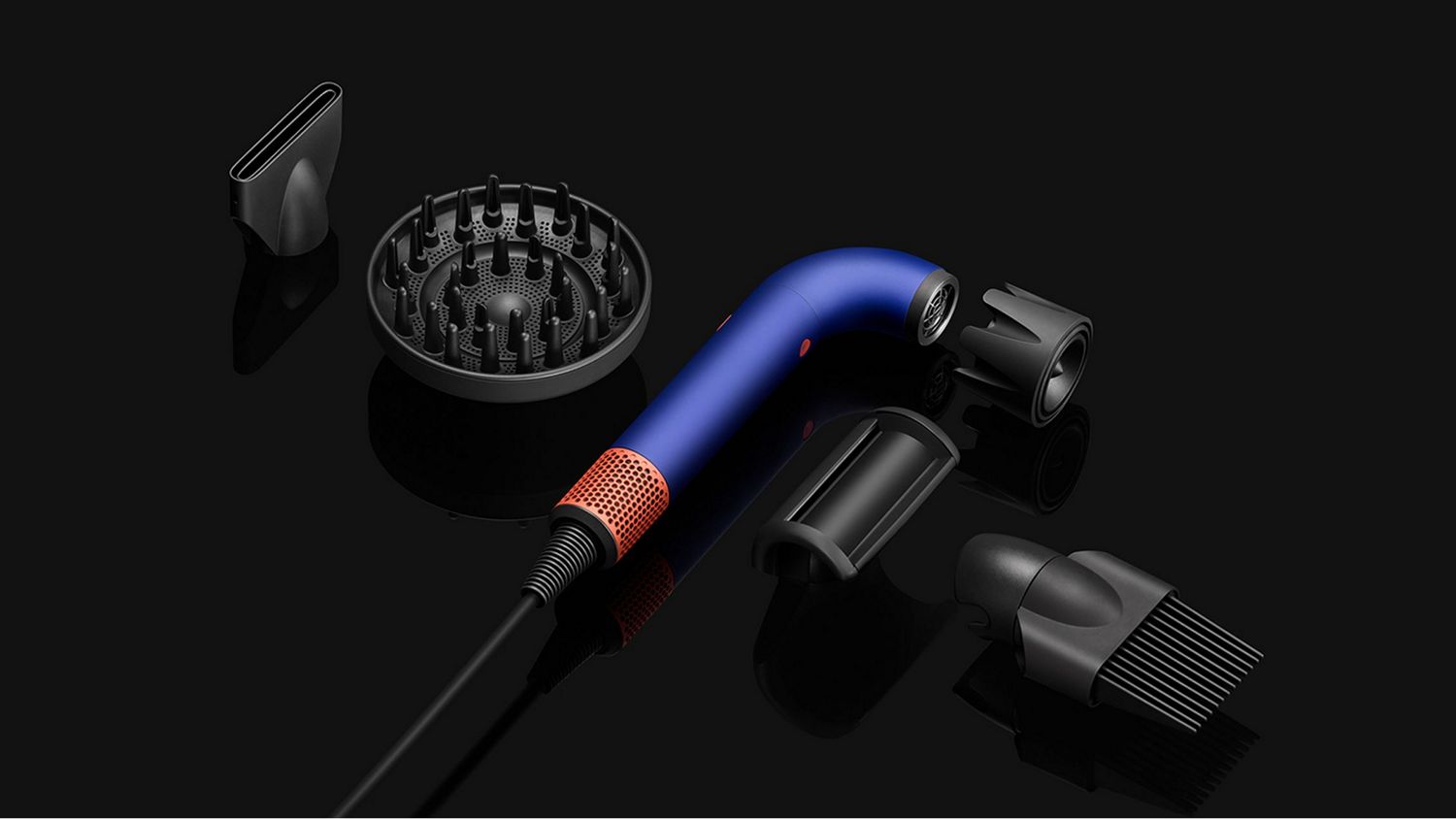 Dyson Supersonic r hair dryer with the five attachments.