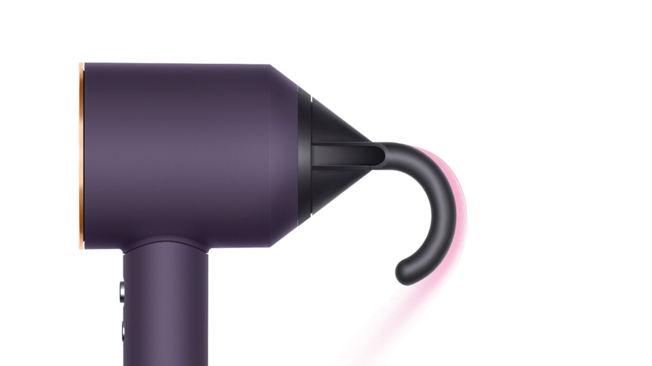 The Dyson Supersonic Professional hair dryer in Bright copper with the Flyaway attachment. The Dyson Supersonic Professional hair dryer in Bright copper with the Flyaway attachment.