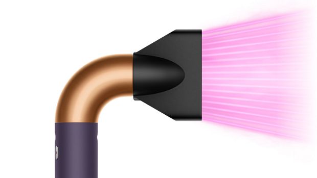 The Dyson Supersonic r Professional hair dryer in Bright copper with the Pro concentrator.