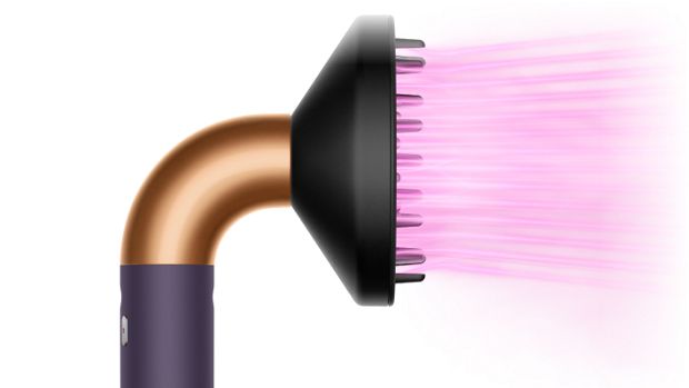 The Dyson Supersonic r Professional hair dryer in Bright copper with the Diffuser.