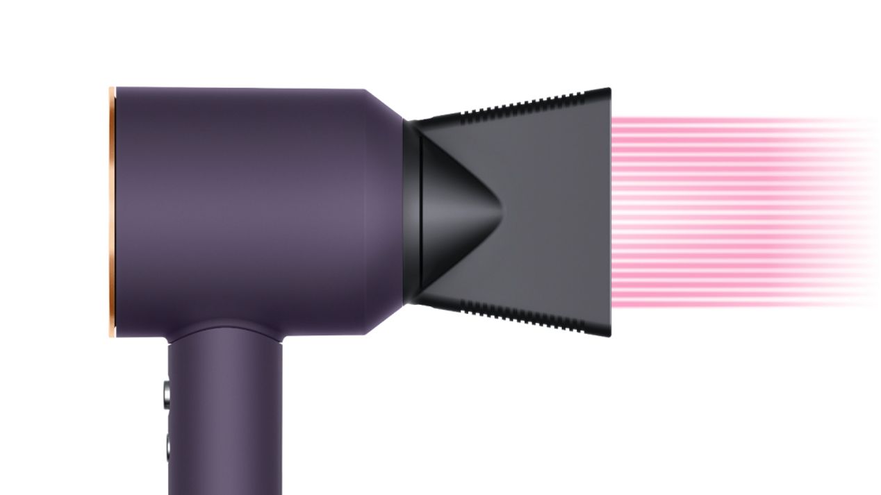 The Dyson Supersonic Professional hair dryer in Bright copper with the Professional concentrator. The Dyson Supersonic Professional hair dryer in Bright copper with the Professional concentrator.