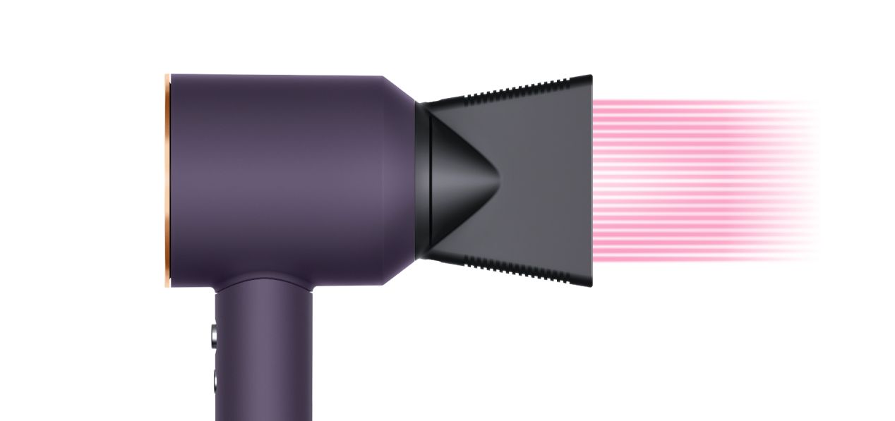 The Dyson Supersonic Professional hair dryer in Bright copper with the Professional concentrator.