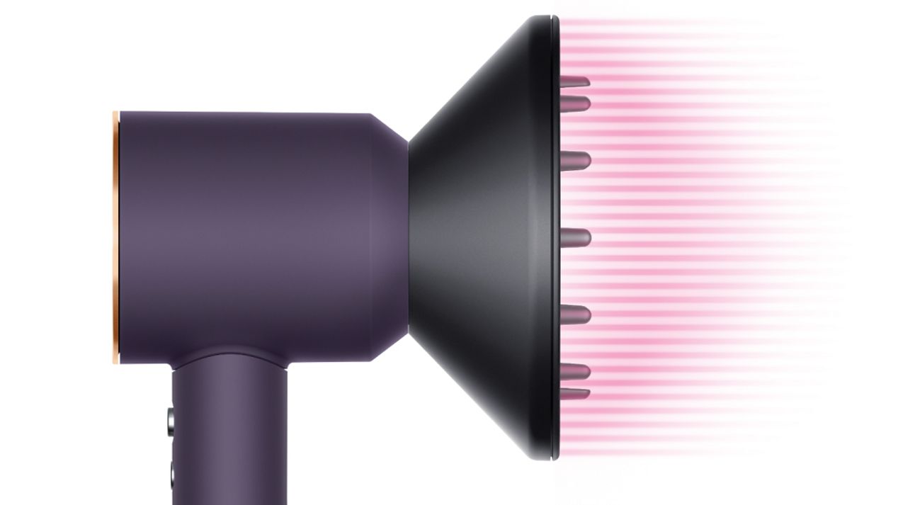 The Dyson Supersonic Professional hair dryer in Bright copper with the Diffuser. The Dyson Supersonic Professional hair dryer in Bright copper with the Diffuser.