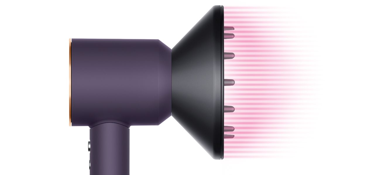 The Dyson Supersonic Professional hair dryer in Bright copper with the Diffuser.