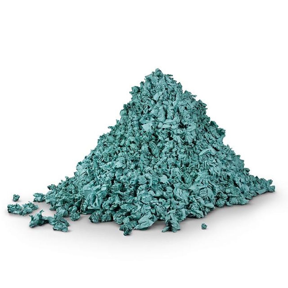 A large pile of discarded single-use paper towels.