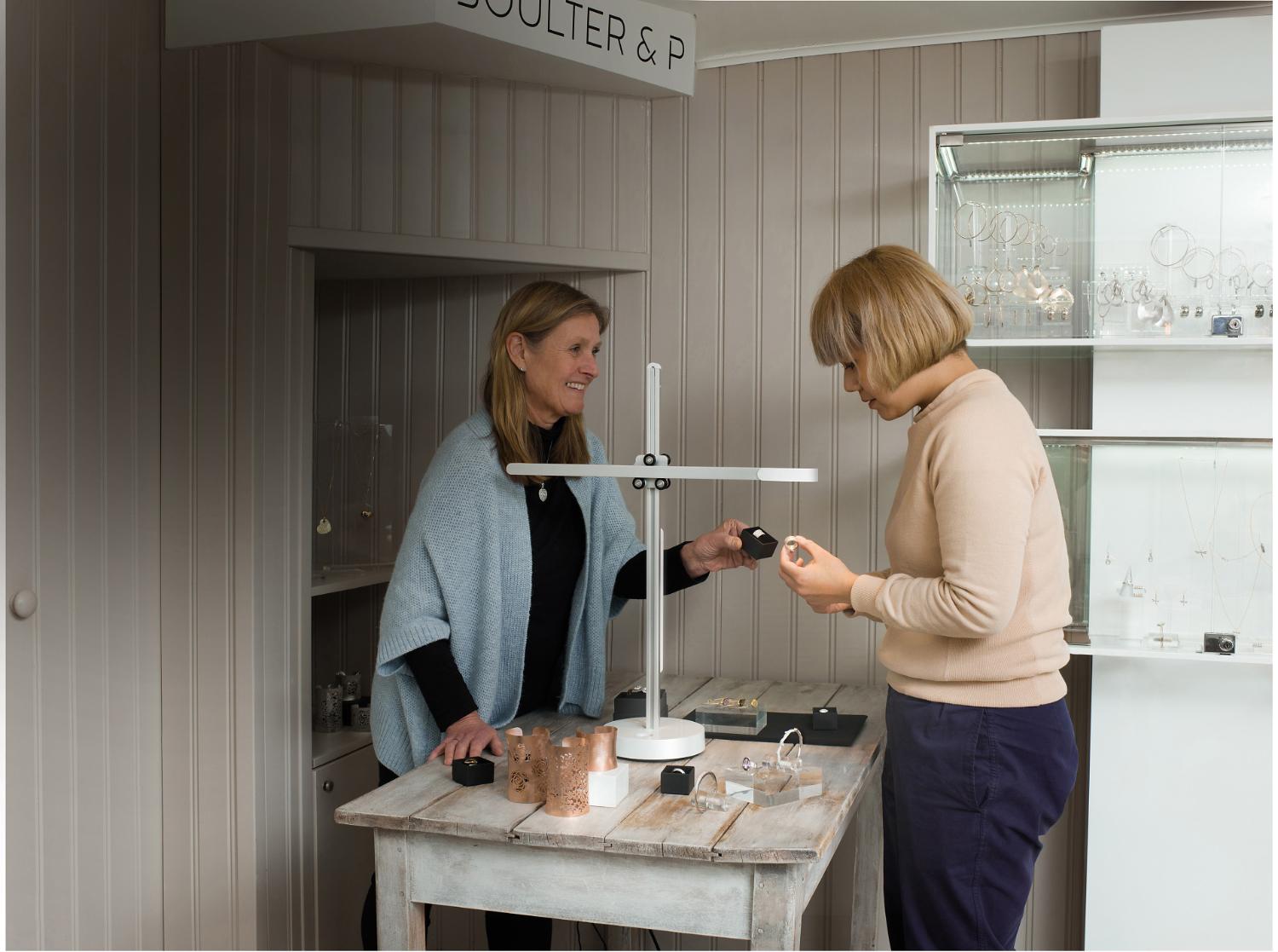 Annette Boulter and Geraldine Purves with Dyson lamp