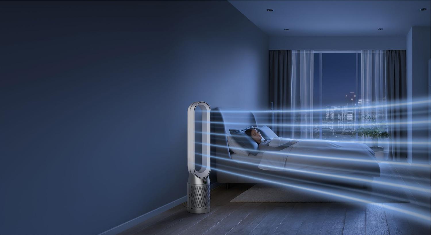 Woman being directly cooled by the Dyson Purifier Cool fan
