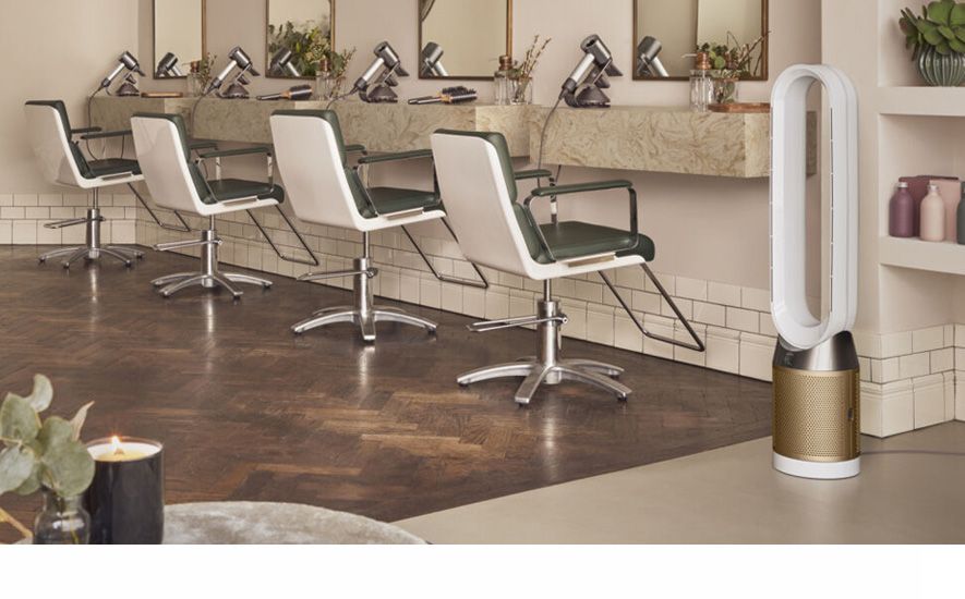 Professional stylist using the Dyson Supersonic professional dryer