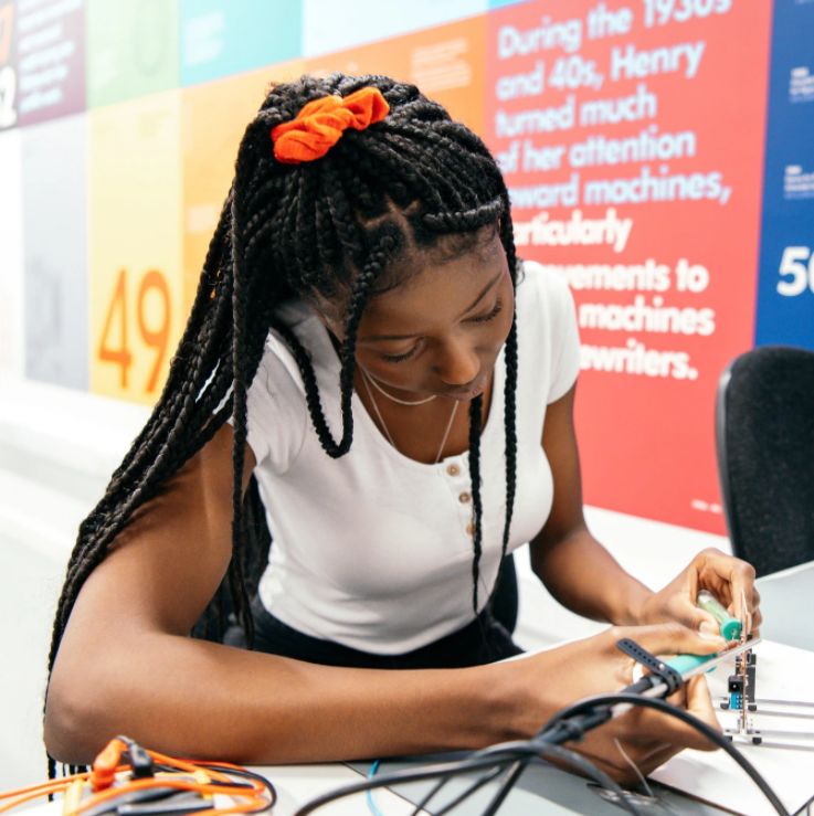 Communal area of the Dyson Institute with students walking around