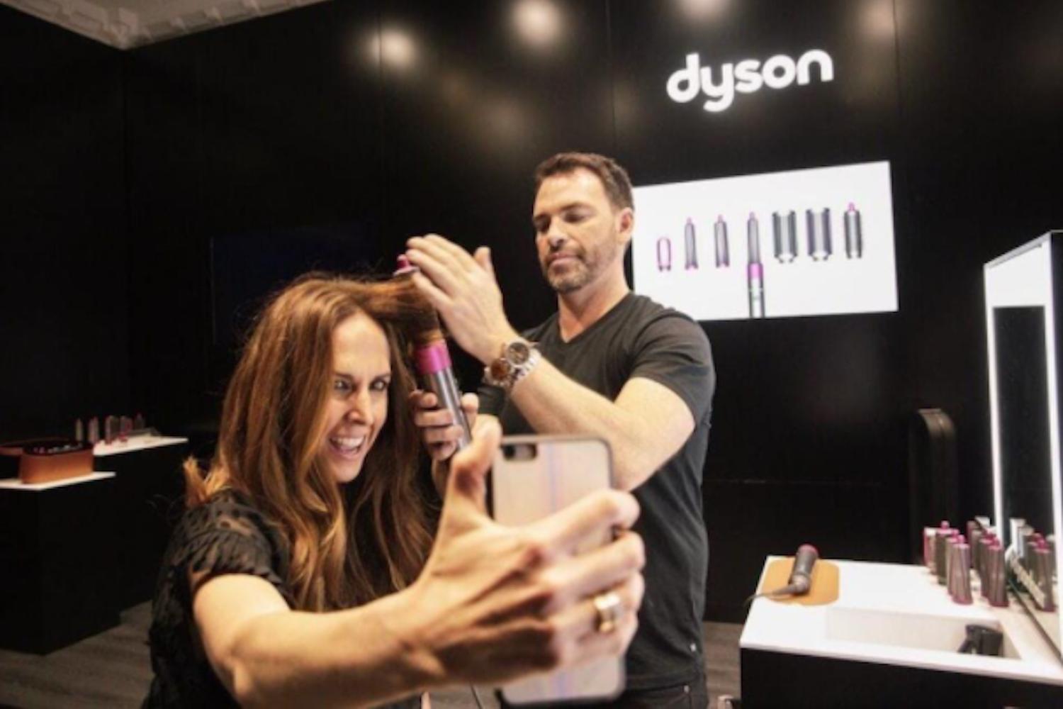 Peter Thomsen styling hair in the Dyson Demo store beauty lab