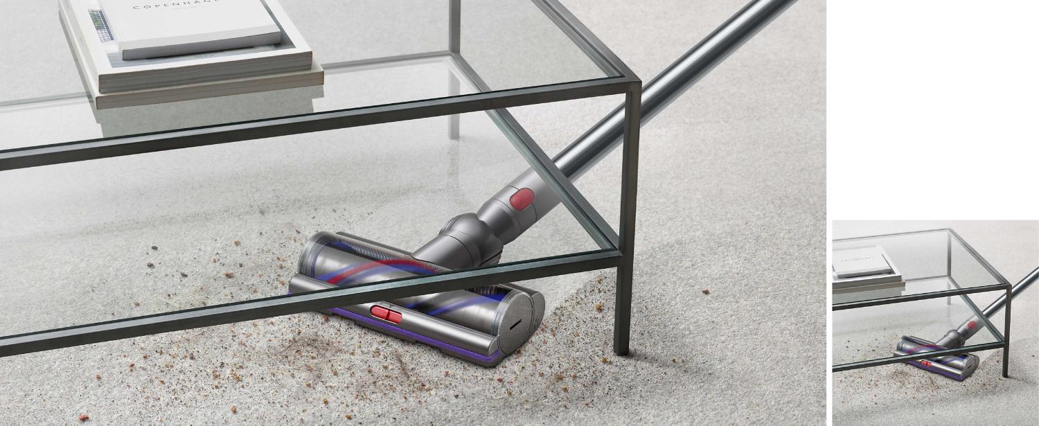 Vacuum cleaner used to vacuum dust and dirt underneath coffee table