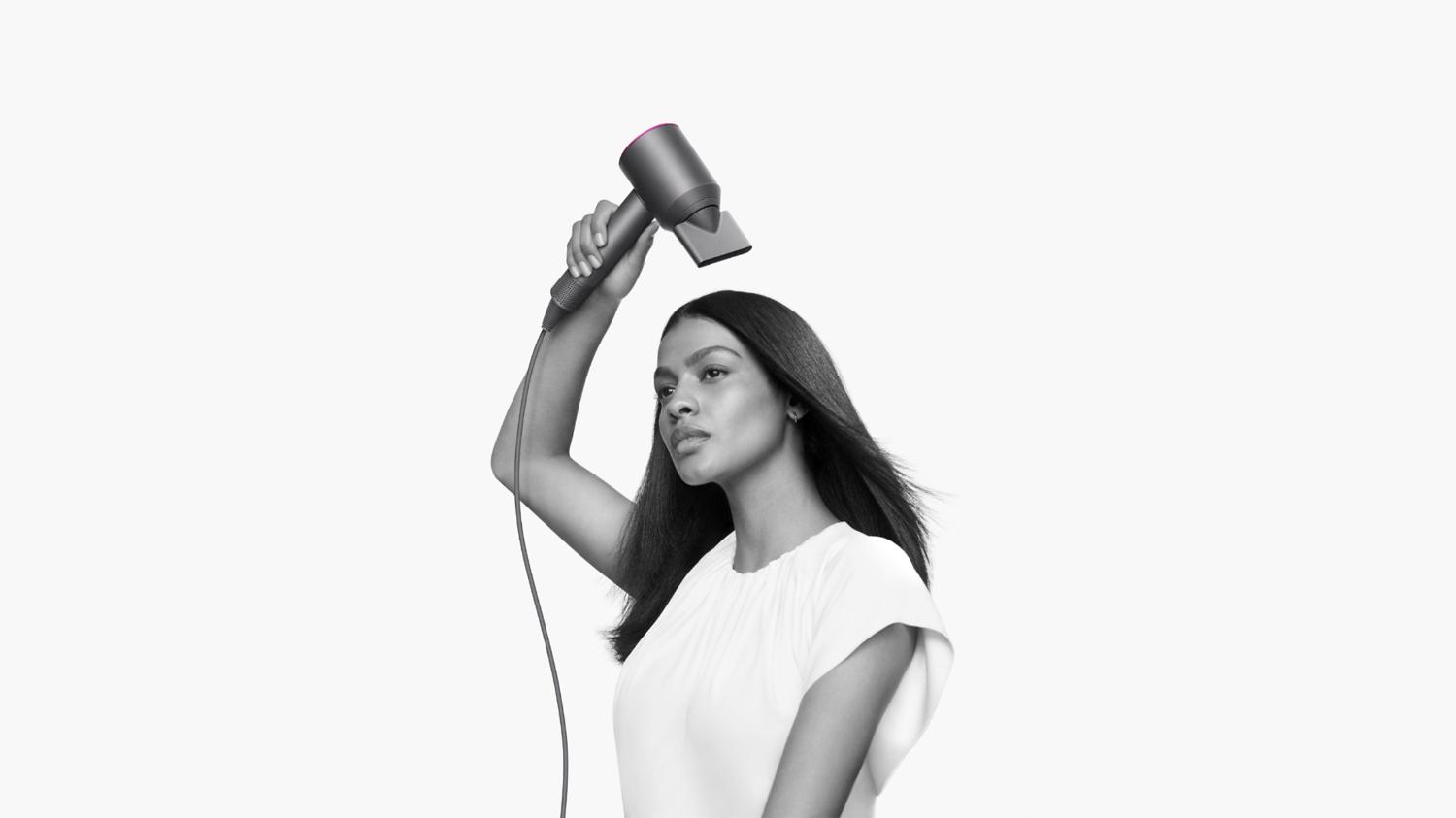 Dyson Supersonic used by woman to style hair