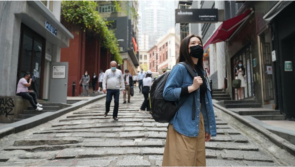 Melody Cheng wearing the Dyson Air Quality backpack. 
