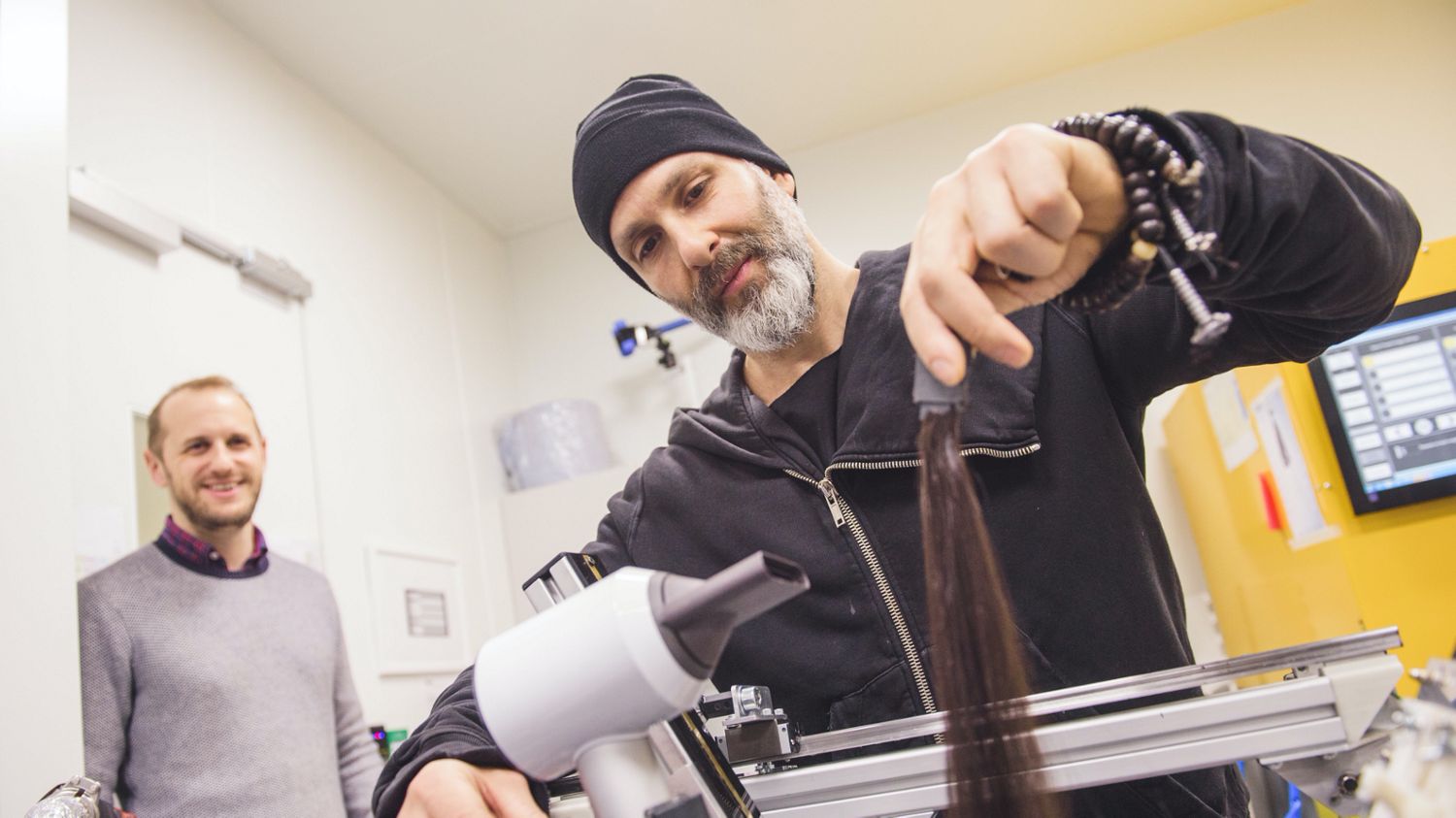 Dyson Global Ambassador Jon Reyman speaks with a Dyson engineer.