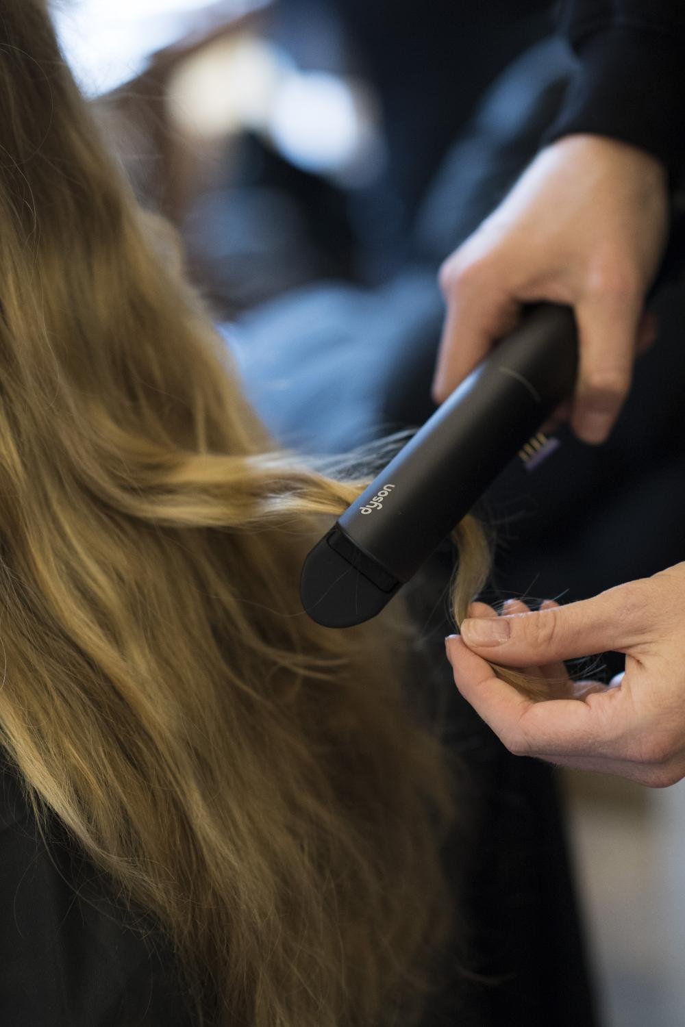 The Dyson Corrale straightener being used at London Fashion Week.