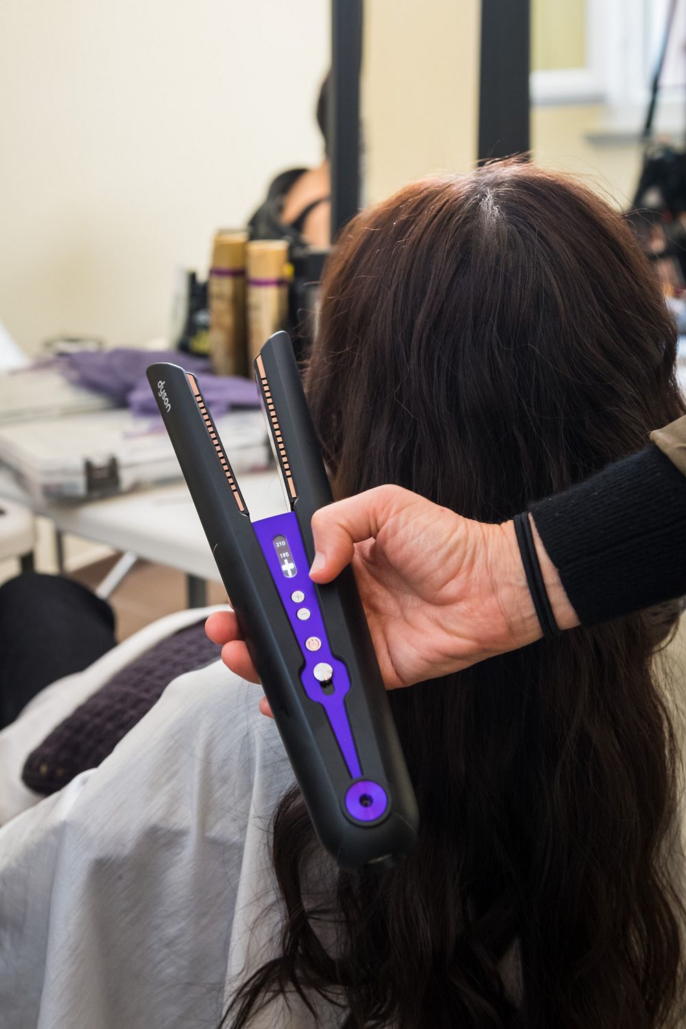 The Dyson Corrale straightener being used at Milan Fashion Week.