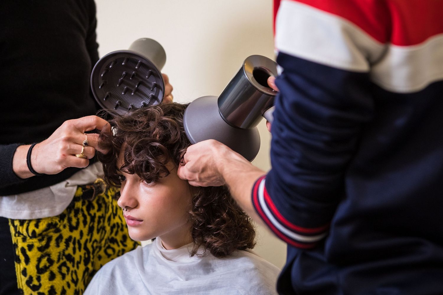 The Dyson Corrale straightener being used at Milan Fashion Week.