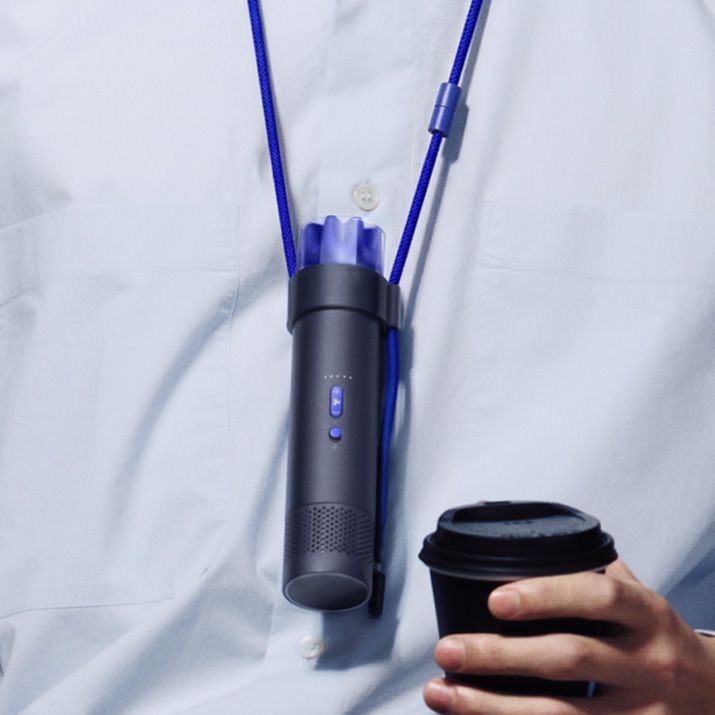 The Dyson HushJet Mini Cool portable fan in the Neck Dock.