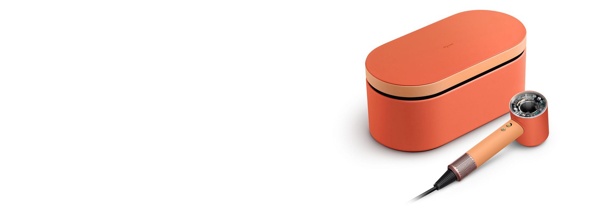 The Dyson Supersonic Nural hair dryer and Presentation case in theCeramic apricot colourway.