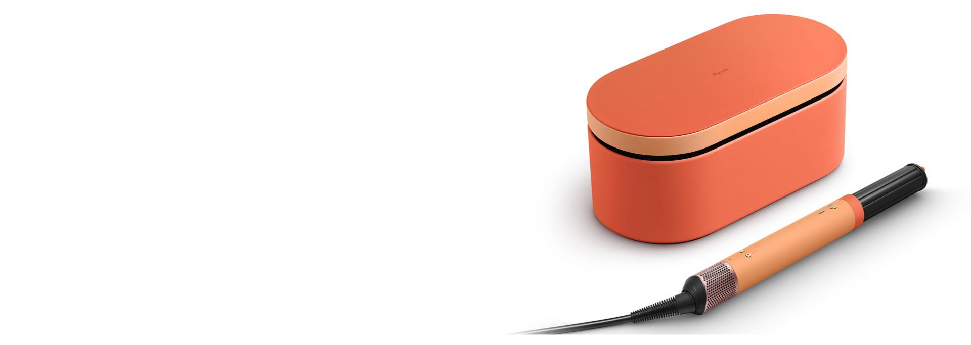 The Dyson Airwrap Co-anda 2x™ multi-styler and dryer and Presentation case in the Ceramic apricot colourway.