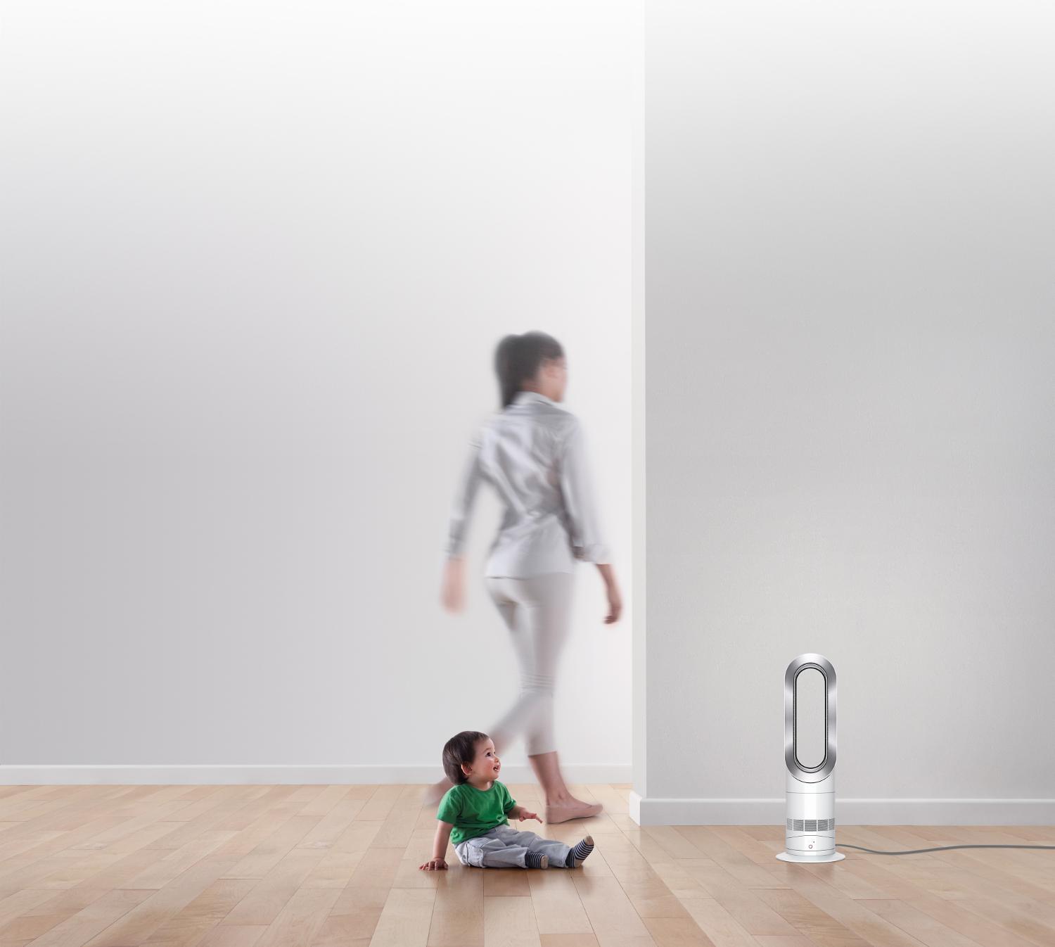 Child with Dyson fan heater