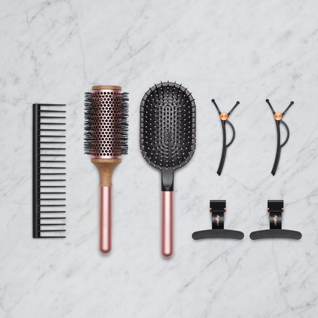 A range of Dyson hair care accessories.