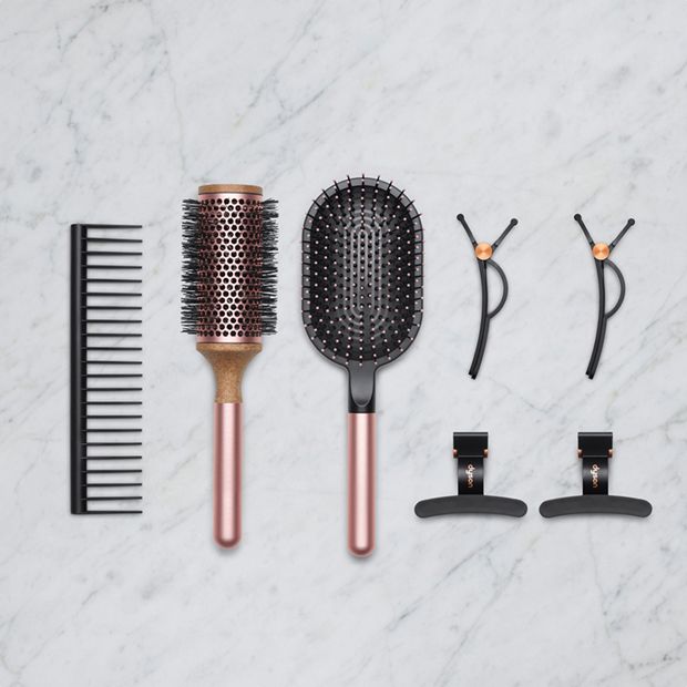 A range of Dyson hair care accessories.