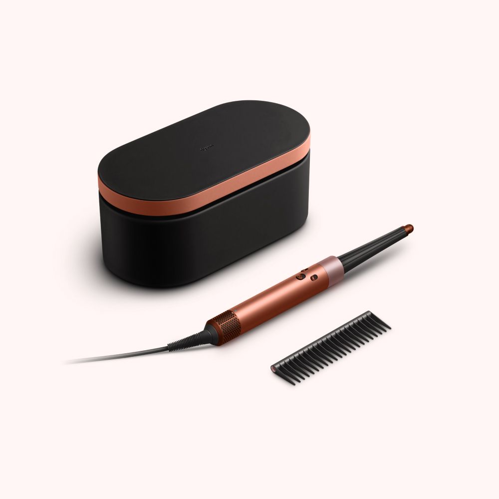 The Dyson Airwrap ID multi-styler and dryer with Presentation case and Detangling comb.
