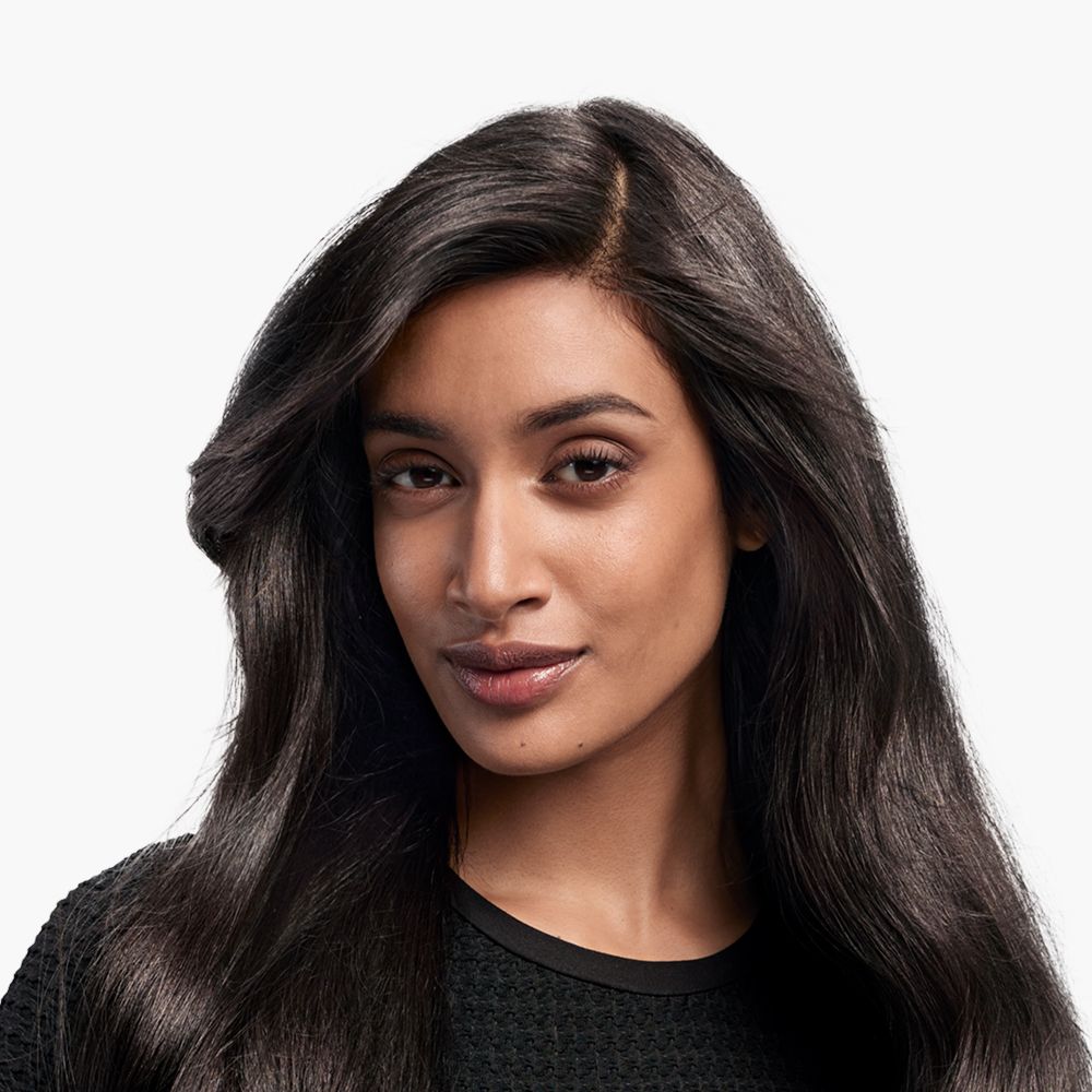 Model with blow-dried hair.