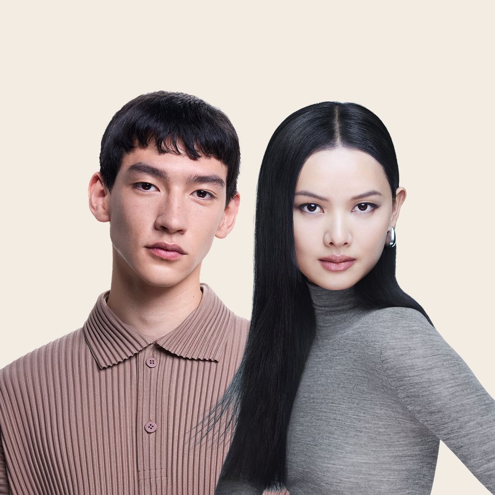 Pair of models with hair styled using the Dyson Supersonic Nural hair dryer.